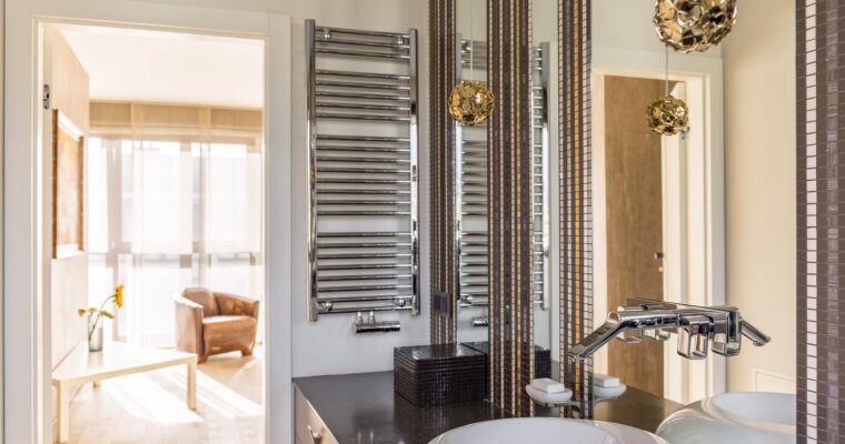 Eleganckie i funkcjonalne grzejniki łazienkowe – przewodnik wyboru